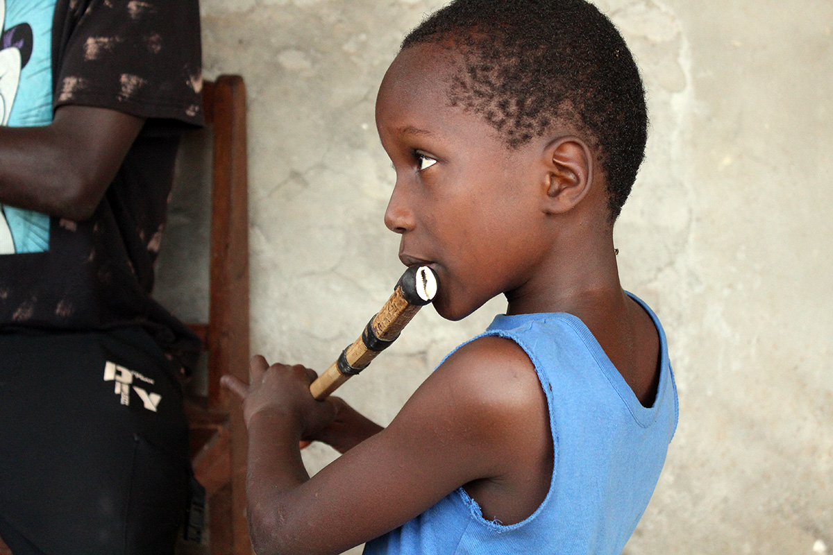 young guinean flute student